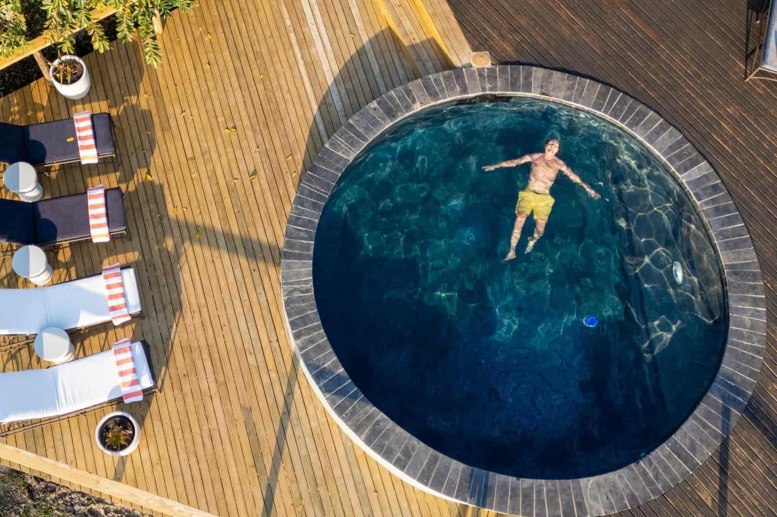 aerial photo of swimming pool with guest