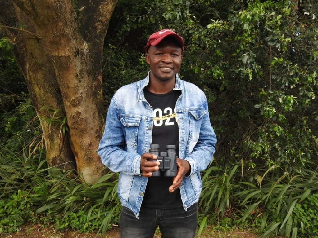 member of development project smiling for portrait